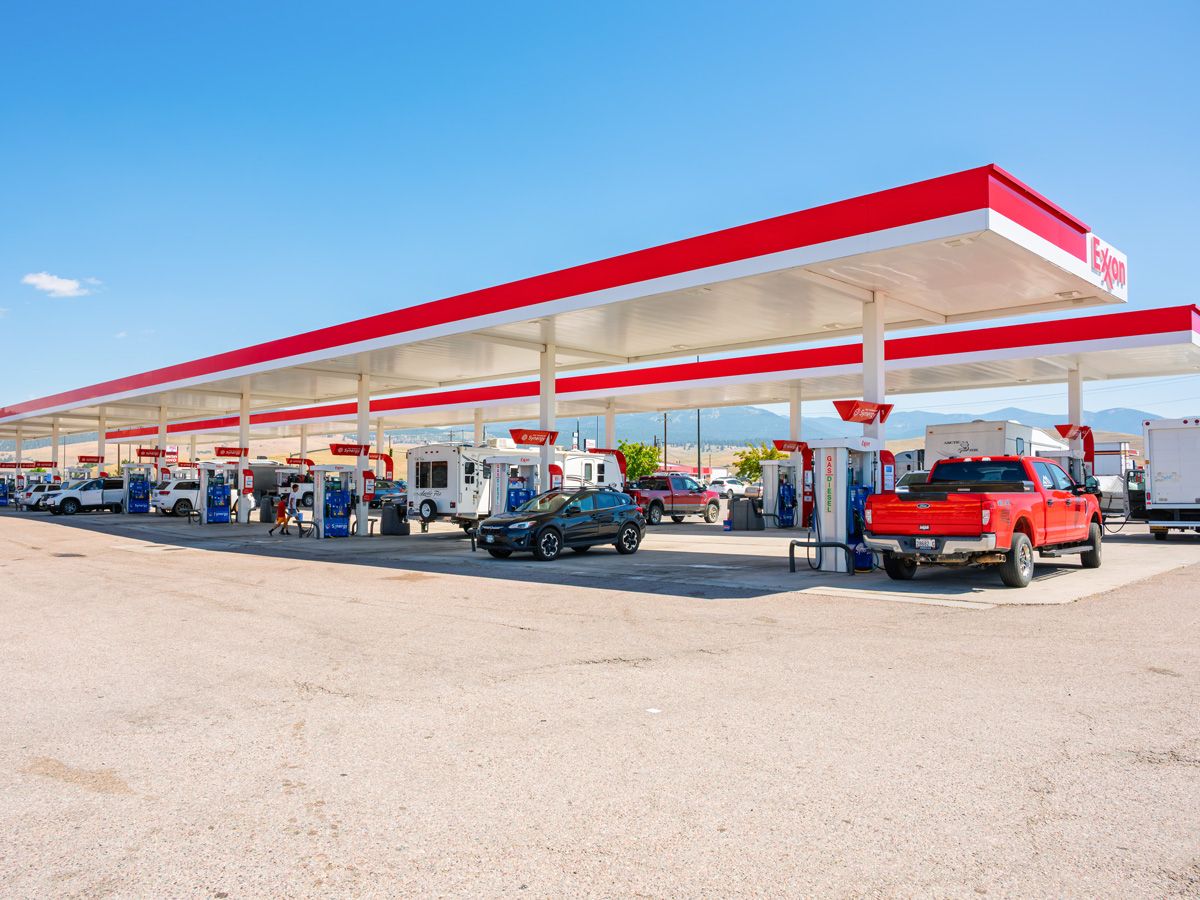 Cars at an Exxon gas station