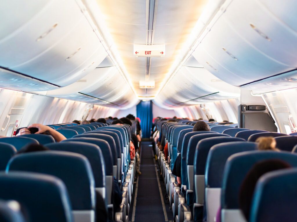 Aisle of passengers on an airplane