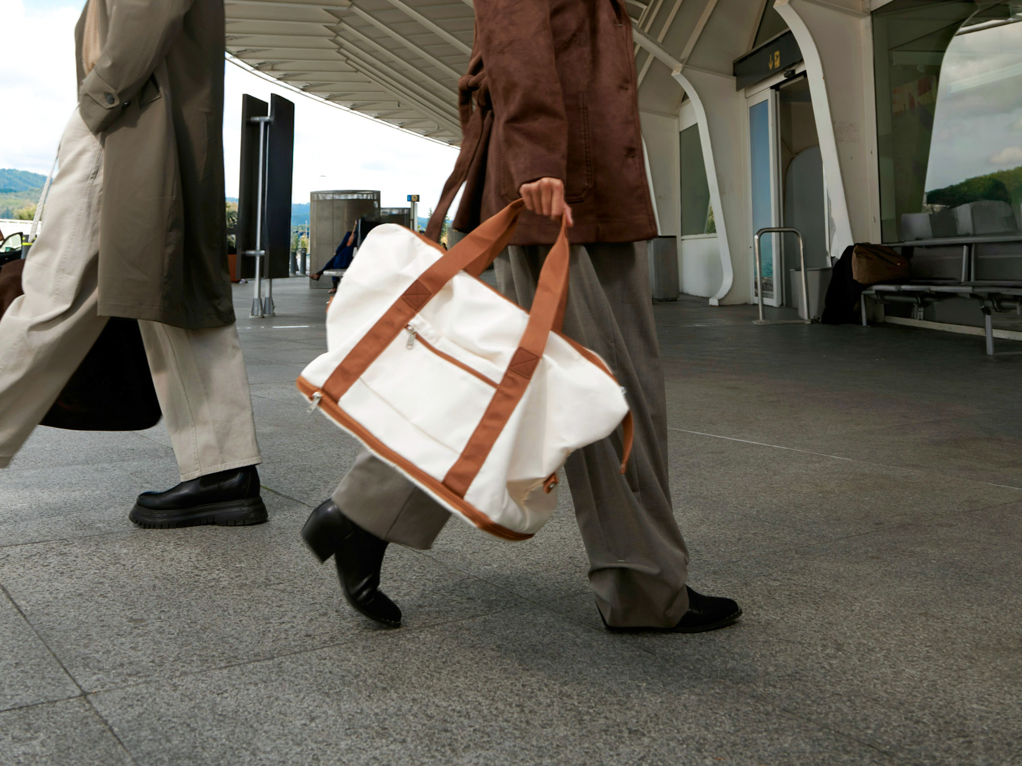 Woman carrying a tote bag