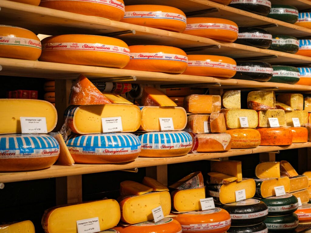 Shelves of cheeses